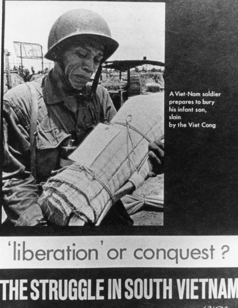 Pamphlet cover with a black-and-white photo of a helmeted soldier cradling a small wrapped bundle, accompanied by the text "'liberation' or conquest? The Struggle in South Vietnam"
